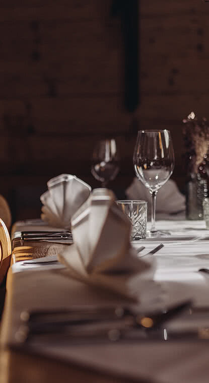 Set table in the restaurant of the Hotel Vermala in Montafon